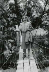 People posing with bridges