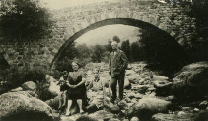 People posing with bridges