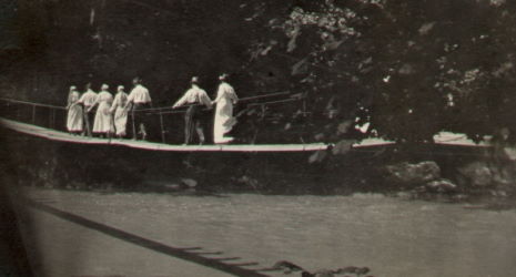 People posing with bridges