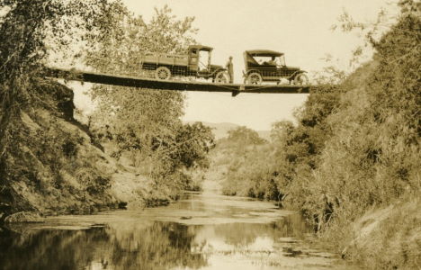 People posing with bridges