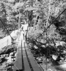 People posing with bridges