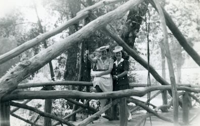 People posing with bridges