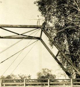 People posing with bridges