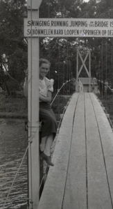 People posing with bridges