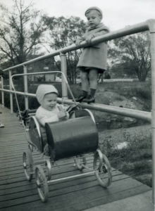 People posing with bridges