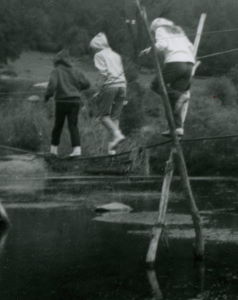 People posing with bridges