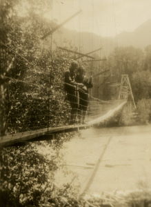 People posing with bridges