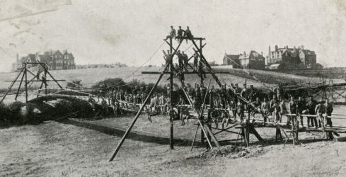 People posing with bridges